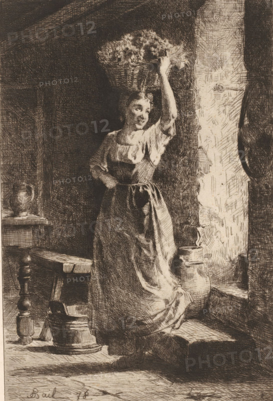 Vintage, La vendange, print, Top right numbered 439., watermark, printmaker: Antoine Bail, France, publisher: Alfred Cadart, Paris, 1878, paper, etching, intaglio printmaking technique, height 295 mm x width 197 mm, grape harvest, Interior, Interiority, A woman stands near a doorway wearing a long dress with an apron tied at her waist, one arm bent with a hand resting on her hip and the other raised to steady a woven basket of flowers balanced on her head; her face is turned slightly to the side and she appears to be smiling. The interior shows a rough textured wall by the doorway, a tall vessel on the floor beside her, a wooden stool and a small table with a pitcher on it, and various carved wooden furniture elements and household containers arranged on the floor and steps, all rendered in fine crosshatched lines.