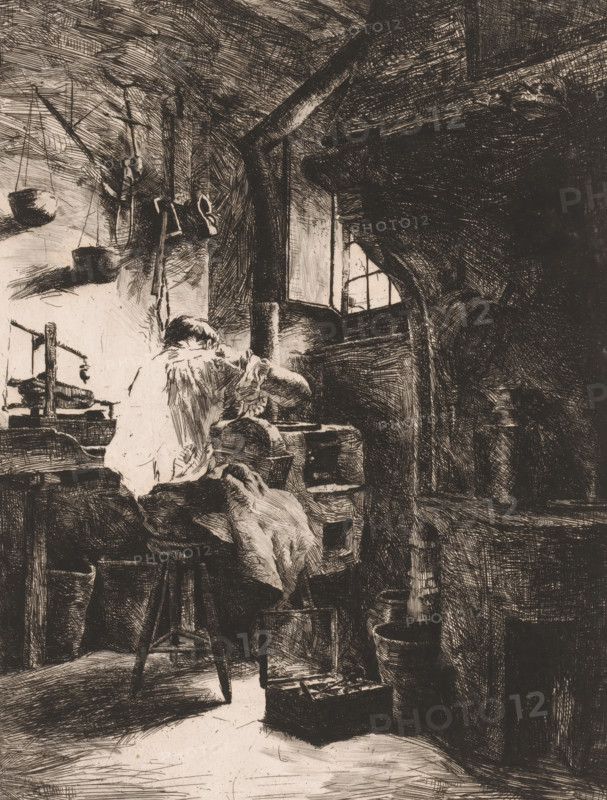 Engraver at work in a workshop, print, inscription: '1e état', printmaker: Charles Mertens, 1875 - 1913, paper, etching, intaglio printmaking technique, etching with plate tone, height 320 mm x width 235 mm, artist at work, in his workshop, A monochrome sketch of an interior space showing a seated figure draped in loose clothing leaning forward at a work surface, surrounding furniture and tools rendered with dense crosshatching, a small window letting light through a rough wall, hanging objects and suspended containers on the left, a large supportive beam and dark recessed area to the right, scattered boxes and buckets on the floor, and varied textures of wood, fabric, and stone throughout.