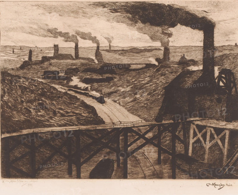 Industrial landscape with viaduct and a passing train, print, printmaker: Karl Meunier, after painting by Constantin Emile Meunier, 1892, paper, etching, intaglio printmaking technique, drypoint, plate tone and drypoint, height 205 mm x width 295 mm, The title of the painting from which the print was made is: 'Au pays noir'. This title refers to the name of the area 'Pays Noir', an industrial area around Charleroi., factory in landscape, railway, train, industries, Charleroi, A sepia-toned etching showing an industrial landscape with a foreground of wooden trestle supports and a shadowed structure, a midground of rolling earth and a steep embankment with a narrow road or path cutting through it, and a background of multiple tall chimneys rising from low buildings, each emitting dark billowing smoke that trails across the sky; the sky is textured with fine hatch marks and the whole scene is rendered in dense linear strokes creating contrasts of light and shadow.
