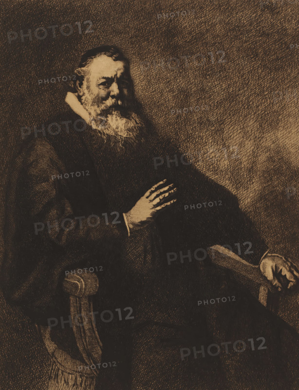 Portrait of an unknown man, print, inscription: '1e état', printmaker: Georges Montenez (signed by artist), after painting by Rembrandt van Rijn, 1894, paper, etching, intaglio printmaking technique, etching with plate tone, height 352 mm x width 242 mm, historical persons, adult man, chair, A sepia-toned engraving of an older man seated in an armchair, shown from the waist up, with a full, curly beard and short hair, wearing a dark robe with a lighter collar visible at the neck, his left hand resting on his chest and his right hand on the armrest, the chair featuring carved wooden armrests and a tasselled upholstery edge, the background filled with dense cross-hatched shading.