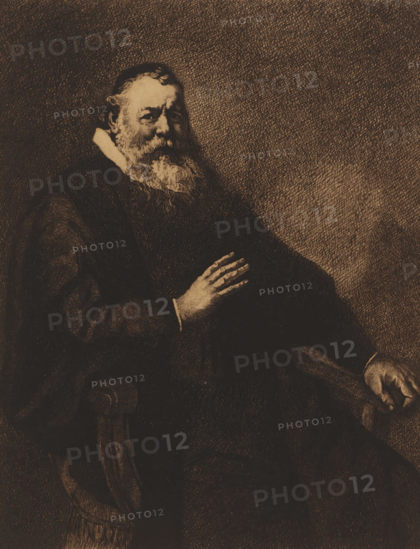 Portrait of an unknown man, print, inscription: '2e etat', printmaker: Georges Montenez (signed by artist), after painting by Rembrandt van Rijn, 1894, paper, etching, intaglio printmaking technique, etching with plate tone, height 350 mm x width 242 mm, historical persons, adult man, chair, A seated older man with a full beard and mustache wears a dark robe and a light collar, his face turned slightly toward the viewer with a calm expression, one hand resting on his chest and the other gripping the arm of a wooden chair; the image is rendered in a densely crosshatched, sepia-toned style with textured shading filling the background and clothing.