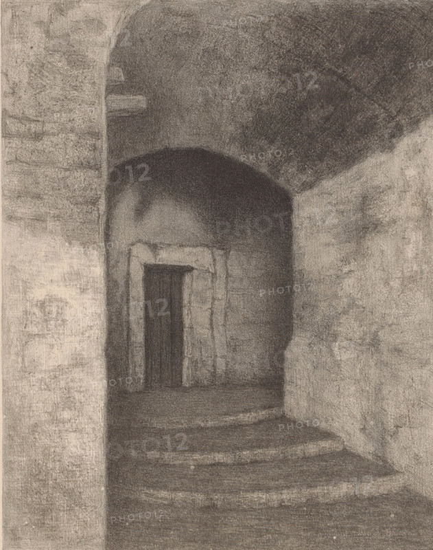Old gate, Small old gate in Ventimiglia, print, At the end of a dark alley, at the top of a staircase, sits a wooden door., inscription: 'after a study, by the late WF Willink van Collen, painter and founder of the W. v. C. Fund', printmaker: Nelly Honig, after design by Wilhelm Ferdinand Willink van Collen, 1889 - 1918, paper, chine collé, lithography, lithography on chine collé, proof print, height 500 mm x width 332 mm, gate, entrance, Ventimiglia, A shaded charcoal drawing of an arched interior passage with textured stone walls and rounded ceiling, showing a recessed doorway framed by rough stone blocks and a dark vertical slit where the door would be, steps leading up through the passage, and varied tonal shading creating depth and shadow across the floor and walls.