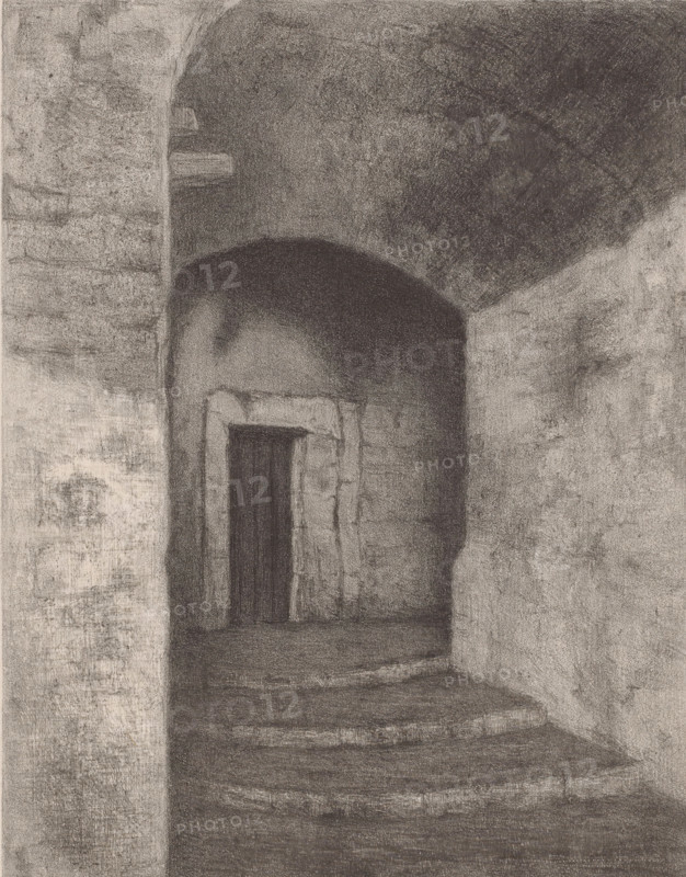 Old gate, Small old gate in Ventimiglia, print, At the end of a dark alley, at the top of a staircase, sits a wooden door., printmaker: Nelly Honig, after design by Wilhelm Ferdinand Willink van Collen, publisher: D. Osseman, Amsterdam, 1889 - 1918, paper, chine collé, lithography, lithography on chine collé, height 500 mm x width 325 mm, gate, entrance, Ventimiglia, A charcoal or pencil drawing of a dim, arched interior space showing rough textured stone or plaster walls and a shadowed archway leading into a recessed doorway framed by worn stone, with a dark vertical opening beyond and layered floor steps receding into shadow, the surfaces rendered in dense, grainy shading and subtle tonal variations.