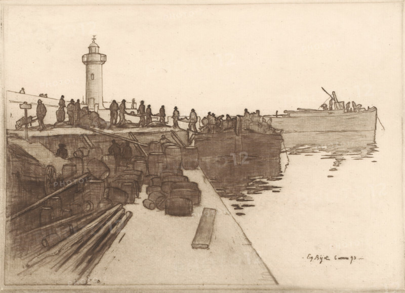 View of a quay with sloops in Cannes, print, printmaker: Eugène Bejot, Cannes, 1893, Provence-Alpes-Côte d'Azur, paper, etching, intaglio printmaking technique, roulette, height 199 mm x width 277 mm, ships (in general) - CC - more than one ship, quay, lighthouse, lightship, A sepia-toned sketch showing a harbor scene with a long pier stretching toward the right where a large boat sits at the waterline, its hull reflected in rippling water. Along the left edge a cylindrical lighthouse rises above the pier with a small gallery near its top. Numerous dark, silhouetted figures stand and move along the pier and on the quay, some gathered in small groups and others appearing to carry or handle long objects. Stacked barrels and planks of timber fill the foreground on the quay, with outlines of wheels and crates among them. The composition emphasizes horizontal lines of the pier, the water, and the distant boat, with delicate, fine linear shading defining surfaces and reflections.