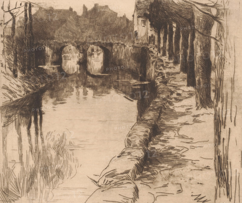 Old bridge in Diksmuide, Vieux Pont, Old bridge over a canal in Diksmuide, print, watermark: 'Van Gelder Zonen', printmaker: Albert Baertsoen, 1897, paper, etching, drypoint, intaglio printmaking technique, height 220 mm x width 258 mm, pier, quay, wharf, bridge in city across river, canal, A sepia-toned sketch of a riverside scene showing a stone walkway running beside a narrow water channel with irregular stones forming its edge, tall thin trees lining the path and their trunks and branches rendered in fine cross-hatched lines, a stone bridge with rounded arches spanning the water in the distance, reflected shapes visible on the water surface beneath the arches, buildings with pitched roofs and simple rectangular facades seen beyond the bridge, and dense hatching used throughout to indicate shadows and texture on the banks, trees, and architectural elements.