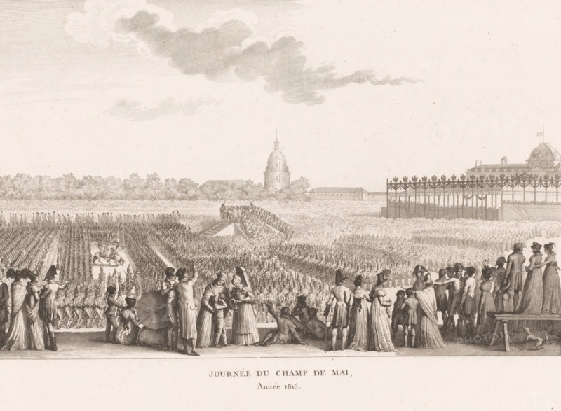 Journée du Champ de mai année 1815, Napoleon I Bonaparte and entourage on Champ de Mai in 1815, print, printmaker: Abraham Girardet, after design by Louis Lafitte, in or after 1815 - 1823, paper, etching, engraving, height 228 mm x width 318 mm, Person, Napoleon I (Emperor of the French), emperor, meeting, assembly - AA - in the open air, Paris, Period, 1815, A wide engraved scene shows a large outdoor gathering with rows of uniformed soldiers standing in formation across a wide field, a central raised platform with figures atop it, and groups of people in period dress gathered in the foreground observing the scene. To the right a decorated viewing stand with many people inside stands above the field, and behind it a domed building with architectural details and surrounding low buildings are visible. The foreground crowd includes men and women in long coats and dresses, some seated, some standing and conversing, and a few mounted riders are visible along a pathway between the formation...