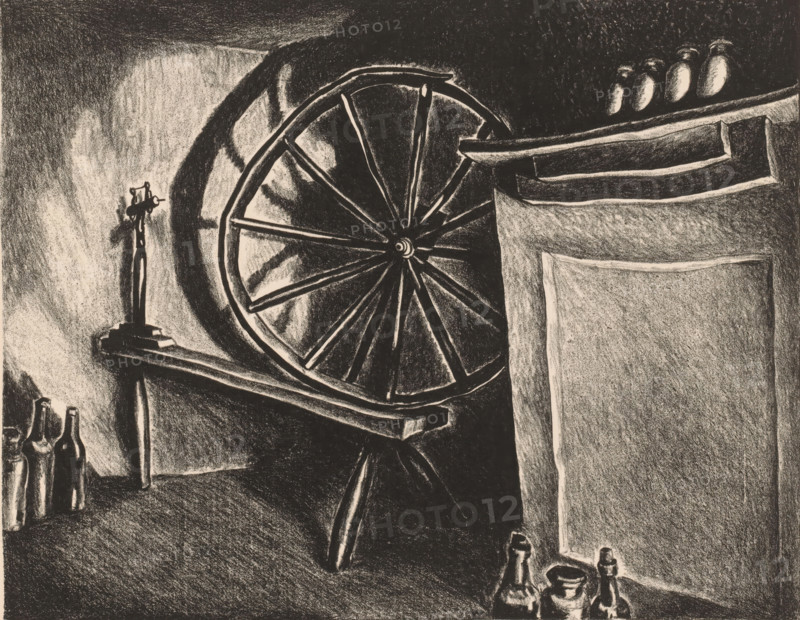 Spinning wheel, print, printmaker: Wanda Gág (signed by artist), 1903 - 1946, paper, lithography, height 292 mm x width 403 mm, spinning-wheel, A dark charcoal drawing shows a large wooden wheel with spokes mounted on a stand against a shadowed wall, with thick beams and angled supports nearby; several glass bottles of varying shapes rest on a surface in the foreground and another cluster sits on a shelf at the far left; three rounded objects sit on a high shelf at the top right; heavy shading creates contrasting light and dark areas across the floor, wall, and wooden structures.