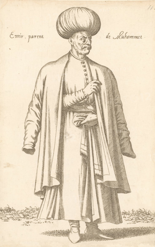 Emir, Emir parent de Mahommet, print, album page, book illustration, Print is part of an album., printmaker: Léon Davent, after drawing by Luca Penni (attributed to), after drawing by Nicolas de Nicolay (possibly), publisher: Guillaume Rouille (I), Lyon, 1555 - 1568, Léon Davet, Attributed to, paper, etching, mounted on album page, height 264 mm x width 172 mm, A monochrome line drawing of a standing man shown from head to toe wearing a large rounded turban and a long flowing robe with wide sleeves and layered drapery, his face rendered with a mustache and goatee and his gaze turned to the side, one hand tucked at his waist holding fabric while the other hand rests near his chest beneath the robe, detailed folds and shading on the garments, simple ground with short grass at the hem, and an otherwise plain background.