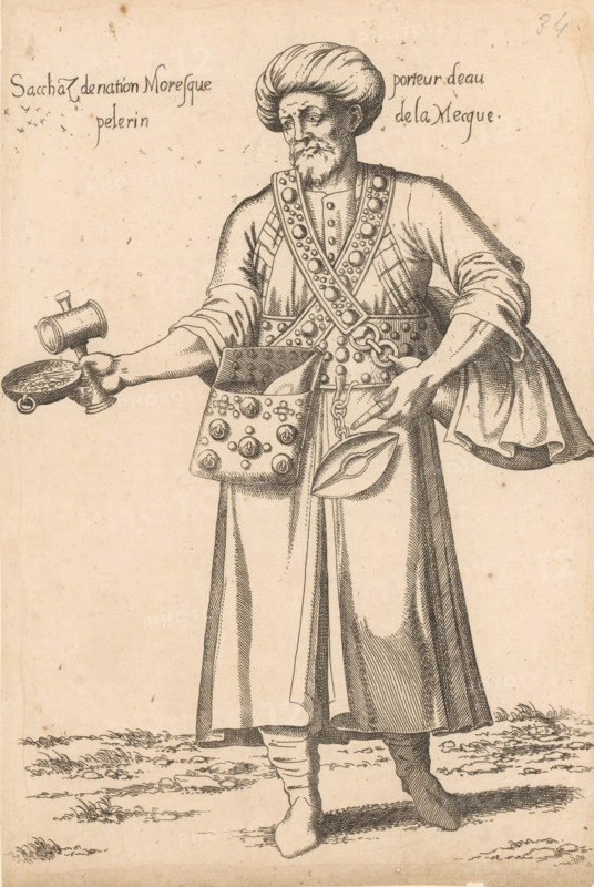 Sacchaz de nation Moresque porteur d'eau pelerin de la Mecque, Water-bearing 'Sacchaz' (pilgrim from Mecca), print, album page, book illustration, Print is part of an album., printmaker: Léon Davent, after drawing by Luca Penni (attributed to), after drawing by Nicolas de Nicolay (possibly), publisher: Guillaume Rouille (I), Lyon, 1555 - 1568, Léon Davet, Luca Penni, Nicolas de Nicolay, Guillaume Rouille (I), printmaker, publisher, Attributed to, paper, etching, mounted on album page, height 270 mm x width 180 mm, A standing bearded man wearing a turban and long flowing robe is depicted in a detailed ink drawing, with one arm extended holding a small tray and a cylindrical vessel and the other hand touching a chain attached to a decorative pouch and a leaf-shaped object at his waist; his vest and cross-body straps are studded with round ornaments, his sleeves are loose and folded, and his footwear is wrapped and pointed, all shown against a plain background with sparse ground texture.
