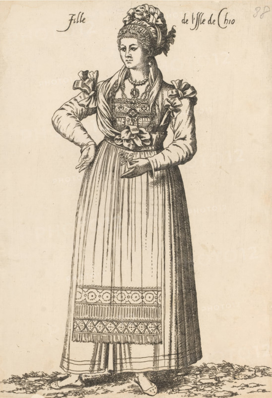 Girl from the island of Chios, Fille de l'isle de Chio, print, album page, book illustration, Print is part of an album., printmaker: Léon Davent, after drawing by Luca Penni (attributed to), after drawing by Nicolas de Nicolay (possibly), publisher: Guillaume Rouille (I), Lyon, 1555 - 1568, Léon Davent, Luca Penni, Nicolas de Nicolay, Guillaume Rouille (I), printmaker, publisher, Attributed to, paper, etching, pasted on album page, height 247 mm x width 175 mm, A full-length ink illustration of a standing woman wearing a long pleated skirt with patterned borders and a decorated apron, a fitted bodice with ornamental stitching and layered necklaces, and puffed sleeves tied with bows; her hair is covered by a wrapped headdress with ruffled edges, and she wears earrings and a pendant; one arm is bent with a hand resting at her waist while the other hand is extended slightly forward holding a small sprig; the scene shows her bare feet on a textured ground and the background is blank.