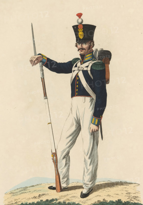 Flanker, Troops in the East Indies, print, A flanker of the Dutch troops in the East Indies. Plate 42. Uniform representation in 'Description of the Royal Dutch Troops' by JF Teupken, 1823., printmaker: Dirk Sluyter, Netherlands, after drawing by Bartholomeus Johannes van Hove, publisher: Jan Frederik Teupken, publisher: Gebroeders van Cleef, printer (person): Giunta d'Albani, Gebroeders, The Hague, 1823, Dirk Sluyter, Bartholomeus Johannes van Hove, Jan Frederik Teupken, Gebroeders van Cleef, Giunta d'Albani, printer (person), paper, etching, engraving, hand coloring, etching and engraving, hand colored, height 300 mm x width 205 mm, (military) uniforms, uniform, flankeurs, Dutch East Indies, The, Period, 1820 - 1823, A colored illustration of a uniformed soldier standing on grassy ground, wearing a dark tall shako hat with a plume and a badge, a dark blue coat with green shoulder straps and yellow-trimmed collar, white crossbelts across the chest, white trousers, and black shoes; he ...