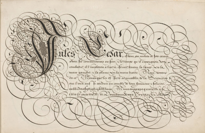 Writing example: Jules Cesar, Spieghel der schrijfkonste, print, album page, ornamental print, Writing example with ornamented initial J and eight lines of text: Jules Cesar ... At the bottom a lowercase alphabet in the corresponding hand. The text is framed by scrollwork., printmaker: Simon Frisius, Haarlem, after design by Jan van de Velde (I), Rotterdam, 1605, paper, engraving, gravure, height 210 mm x width 320 mm, calligraphy, An ornate sheet filled with elaborate black ink flourishes and swirls on a pale background, featuring large densely hatched curved shapes on the left that transition into looping, ribbon-like strokes spreading across the page, with tightly packed decorative curls and fine hairline loops clustered near the center and margins, and broader sweeping spirals and elliptical bands occupying the lower and right areas, all rendered with varying line thicknesses and occasional shaded fills.