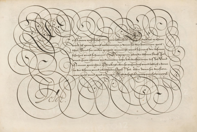 Writing example: Es ist, Spieghel der schrijfkonste, print, album page, ornamental print, Writing example with initial E and eight lines of text in German: Es ist ... quad erheiget(?). The example ends with a lowercase alphabet in the hand in question. The text is framed by scrollwork., printmaker: Simon Frisius, Haarlem, after design by Jan van de Velde (I), Rotterdam, 1605, paper, engraving, gravure, height 210 mm x width 320 mm, calligraphy, A sheet with dense ornamental calligraphic swirls and flourishes drawn in dark ink across a light, slightly textured background, with a central block of tightly spaced cursive script partially surrounded and overlapped by large looping spirals, curving hooked strokes, teardrop-shaped terminals, and interlacing circular lines that extend toward the edges of the page, showing variations in line thickness and faint paper discoloration and small spots.