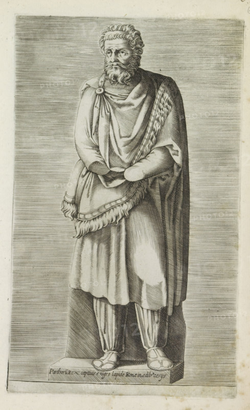 Parthoru rex captivis e nigro lapide Romae in aedib Cesys, Sculpture of a captive king, Antiquarum statuarum urbis Romae quae in publicis locis visuntur icones, Ancient sculptures in Rome, print, album page, Latin caption at the base of the image. Print is part of an album., number: '34', printmaker, publisher, Rome, Italy, paper, engraving, height 222 mm x width 134 mm, This print is part of a set of 79 prints (title print) depicting ancient sculptures in Rome., piece of sculpture, reproduction of a piece of sculpture, ruler, sovereign, A monochrome engraving shows a standing bearded man wearing layered draped robes fastened at one shoulder with a circular clasp, a fringed cloak over one arm, and a long tunic reaching toward his legs; his hair is curly and his beard is full, his hands are positioned in front of him with one arm partially covered by the cloak, and he stands on a rectangular plinth while wearing patterned leggings and closed shoes, all set against a background of closel...
