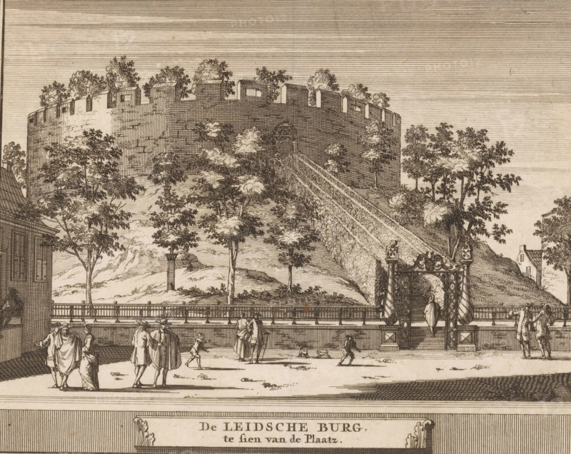 View of the castle of Leiden, The Leiden Castle seen from the square, Castles, country estates and houses in the Netherlands, print, book illustration, printmaker: Jacobus Schijnvoet, Amsterdam, after drawing by Roelant Roghman (possibly), publisher: Pieter de Coup (possibly), 1711, paper, etching, height 195 mm x width 215 mm, Print first used in: Smids, Ludolph. Schatkamer der Nederlandse oudheden, of Woordenboek, between p. 198 and 199. Possibly appeared thereafter in reissues of this work in 1737 and 1774. In 1721, an edition appeared containing only the prints: Nederlandsche oudheden, bestaan in zesachtig verbeeldingen, gelegen in Holland, 't Sticht van Utrecht en Gelderland enz. Amsterdam: Hendrik Bosch, 1721., fortress, street (city(-scape) with figures, staffage), Leiden, Burcht van Leiden, A detailed engraved scene shows a large circular stone fortress atop a grassy, tree-covered hill, with crenellated walls and small trees growing along the battlements; a long sloping path or...
