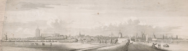 View of Zierikzee, 1743, The city of Zierikzee, seen from the West-Haven-Dyk, print, book illustration, printmaker: Jan Caspar Philips, Amsterdam, after drawing by Cornelis Pronk, publisher: Isaak Tirion, grantor of privilege: Staten van Holland en West-Friesland, 1751, States of Holland and West Friesland, provider of privilege, paper, etching, height 168 mm x width 472 mm, A wide monochrome engraving shows a riverside town with a low skyline of church towers and clustered buildings behind rows of trees, windmills at the edges, and numerous sailing ships and masts clustered near docks on the right; the foreground features an earthen embankment or road running toward the town with a few figures walking and standing, a dog, a seated person near the water, small boats with occupants, grazing horses and scattered people on the open plain to the left, and clouds filling the sky above.