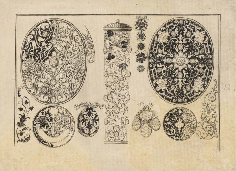 designs for snuffbox and jewelry lids, print, album page, ornamental print, Series number, 12, 16, Left and right a design for a snuffbox lid. In the center an ornamental column and at the bottom designs for jewelry. Black ornaments. Print is part of an album., number: '12', printmaker: Johann Lorenz Hönnig, Nuremberg, 1707, Bavaria, paper, engraving, height 134 mm x width 185 mm, ornaments, art, snuff-box, jewels, A beige sheet with a thin rectangular border contains a series of black ink ornamental designs including two large oval medallions filled with intricate scrolling foliage and floral motifs, each with a central rosette and contrasting dark backgrounds; a narrow vertical column topped with a domed cap and covered in leafy scrollwork and oval textured elements; a vertical row of small floral rosettes beside the column; several smaller circular and egg-shaped ornaments featuring dense arabesque patterns and stylized leaves; a cluster of three tumbled circular motifs with lattice...