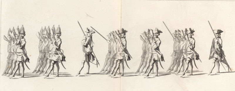 Funeral station of Willem IV, 1752, plate 9, Hollandsche Guardes, Lyk-statue of His Most Serene Highness the Lord Willem Carel Hendrik Friso, Prince of Orange and Nassau, held on the IV of February 1752, print, album page, Series number, 9, 41, The Dutch Guard. In the margin a caption in Dutch, French and English., printmaker: Jan Punt, after drawing by Pieter Jan van Cuyck, publisher: Pierre Gosse jr., The Hague, publisher: Nicolaas van Daalen, 1755, paper, etching, engraving, etching and engraving, height 270 mm x width 560 mm, Person, Willem IV (Prince of Orange-Nassau), cortege, funeral procession, military parade, pageant (infantry), Funeral of Willem IV (1752), Death of Willem IV (1751), Delft, Period, 1752-02-04, A wide, sepia-toned engraving shows rows of uniformed soldiers marching across a blank background, each figure depicted in profile or three-quarter view with long coats, knee-length breeches, stockings, and buckled shoes, many carrying long muskets or pikes held upright...
