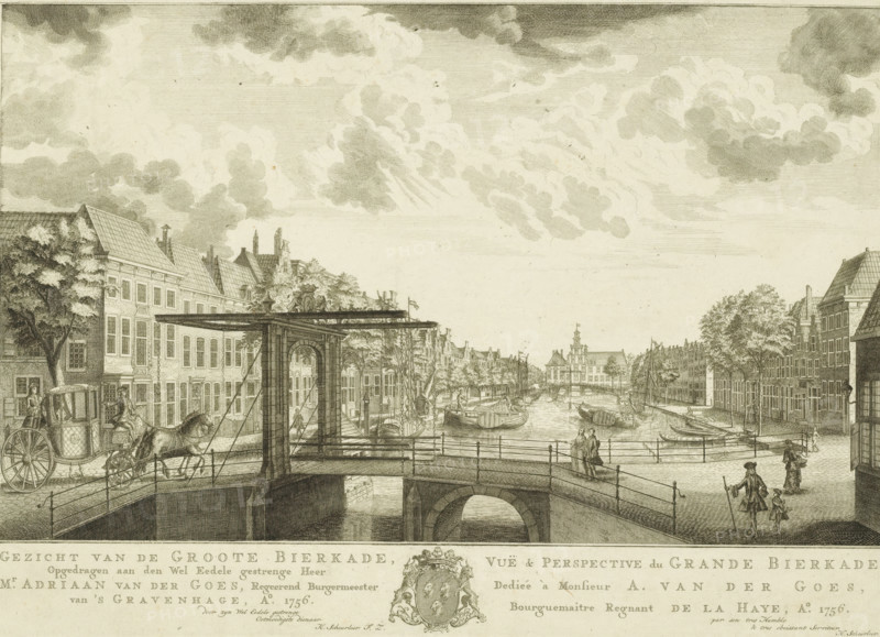 View of the Groote Bierkade, Vuë & perspective du Grande Bierkade, View of the Bierkade in The Hague, Eighteen views in and around The Hague (Besoet, Scheurleer), print, View of the Bierkade in The Hague. In the foreground the Wagenbrug and in the background the Diaconie Old Women's and Children's Home. Below the image the title and dedication in Dutch and French, with in the center the family coat of arms of The Hague mayor Adriaan van der Goes. Print from a series of eighteen views in and around The Hague., printmaker: attributed to Iven Besoet, The Hague, publisher: Hendrik Florisz Scheurleer, dedicated to: Adriaan van der Goes (1722-1797), 1756, Attributed to, paper, etching, engraving, height 308 mm x width 430 mm, Print is part of a series of eighteen views in and around The Hague that were published over the period 1755-1762., armorial bearing, heraldry, bridge in city across river, canal, orphanage, street (city(-scape) with figures, staffage), Diaconie Oude Vrouwen- en Kinderh...