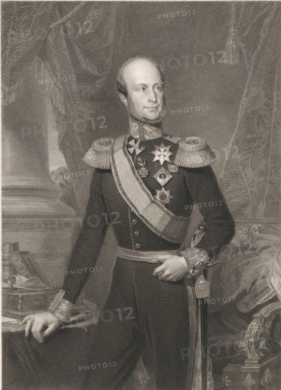 Portrait of King William II, print, printmaker: Michel Charles Antoine Verswyvel, Antwerp, 1829 - 1868, paper, chine collé, etching, engraving, etching and engraving on chine collé, height 620 mm x width 466 mm, Person, William II of the Netherlands, historical persons, royal house, Period, 1772 - 1843, A monochrome engraving of a man shown from head to mid-thigh wearing a formal military uniform with ornate epaulettes, a decorated high collar, and a sash across his chest adorned with multiple star-shaped and cross-shaped medals. He has a high forehead, receding hair, sideburns, and a composed facial expression while looking slightly to his right. One hand rests on a table covered with drapery and objects including a closed box and a rolled item, while the other hand holds the hilt of a sword suspended by a decorated belt. Behind him are heavy draperies and a column, and to his side is an upholstered chair with carved armrests. The image is rendered with fine crosshatching and detailed...