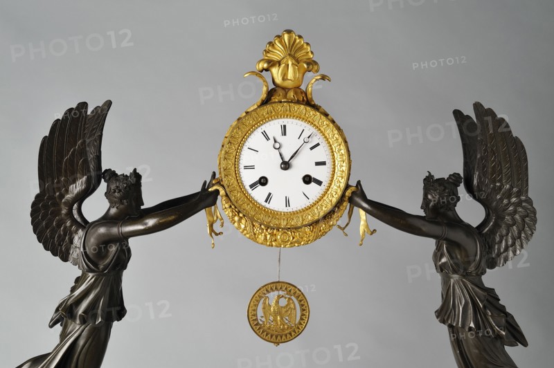 Tomire, Pendule (détail)