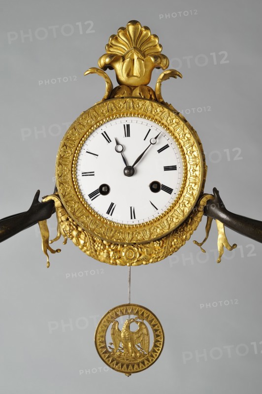 Tomire, Pendule (détail)