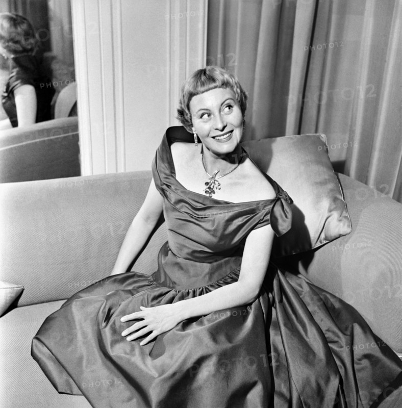 Michele Morgan, famous French film star arrived in London today to be guest of honour at the gala premiere of her new film "The Seven Deadly Sins" at the Cameo, Polytehcnic Theatre. December 1952 C6084-001