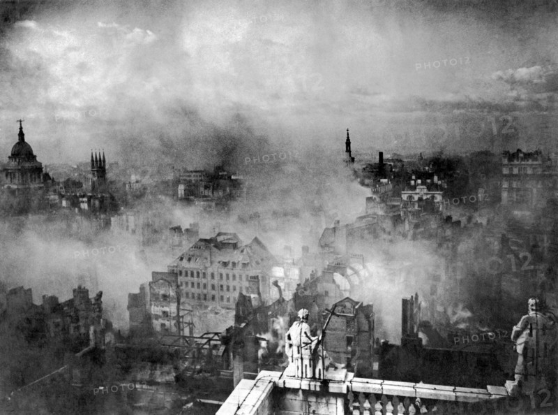View of the city of London taken from the roof of St Paul's Cathedral showing the devastation and burning buildings following the blitz of the 29th December 1940. Also known as " the second great fire of London " P009498