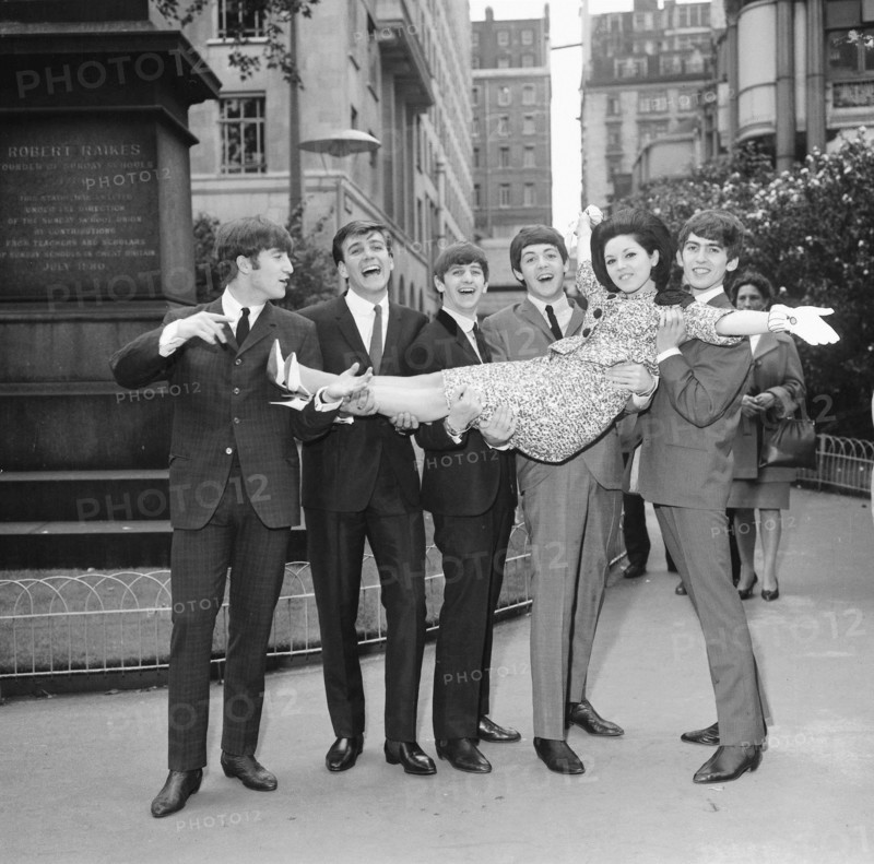 John Lennon Paul McCartney George Harrison and Ringo Starr with Billy J Kramer and Susan Maughan celebrate their success at Victoria Embankment Gardens in before a lunch at the Savoy to celebrate the Variety Club's awards London 10 September 1963