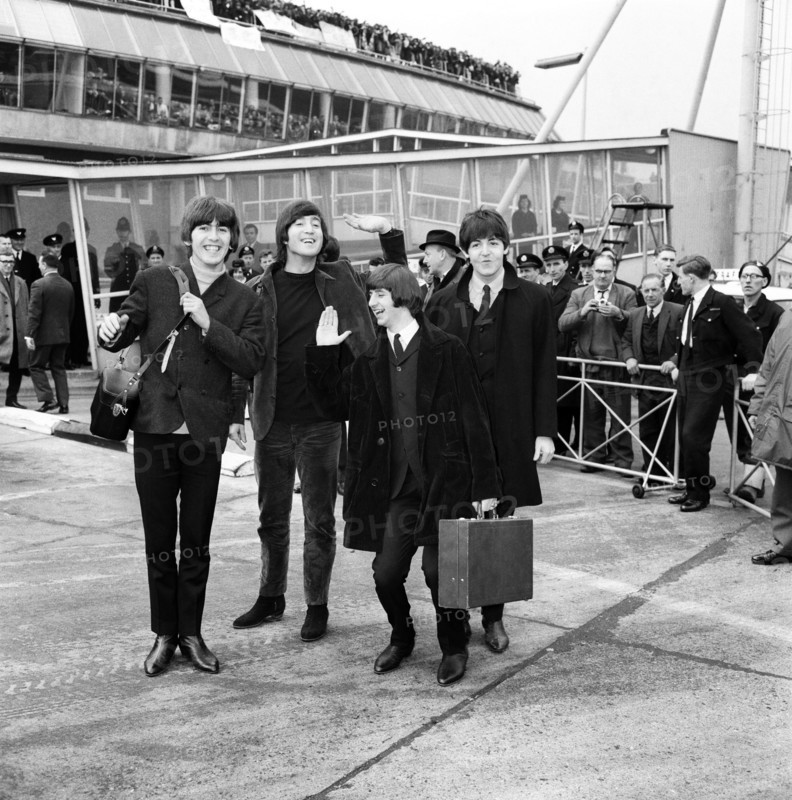 The Beatles leave London Airport bound for the Bahamas to commence filming on their second movie, "Help!", 22 February 1965. Left to right: George Harrison, John Lennon, Ringo Starr and Paul McCartney.