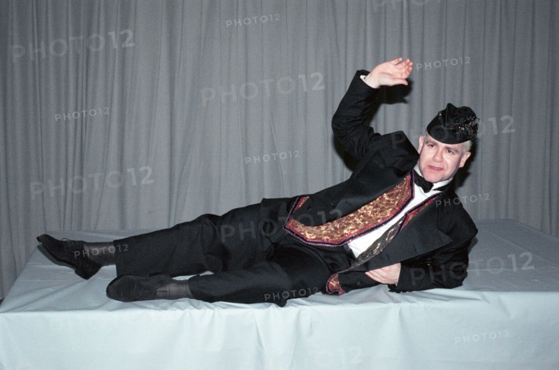 Elton John pictured in Paris where he is performing during his Reg Strikes Back Tour. 23rd March 1989.
