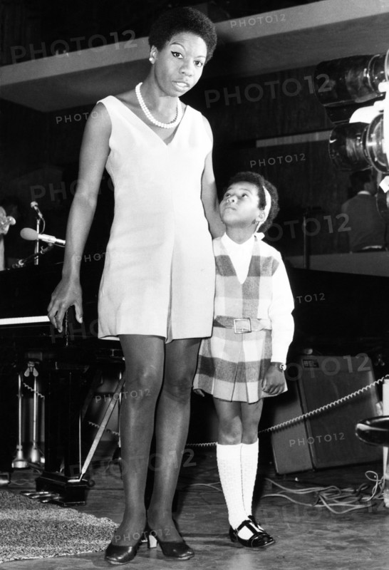 American singer, Nina Simone, in the UK recording a television programme called 'Sound of Soul' for London Weekend Television. Her 5 year old daughter Lisa loves to watch her mother at the studio, Wembley, London. 28th May 1968.