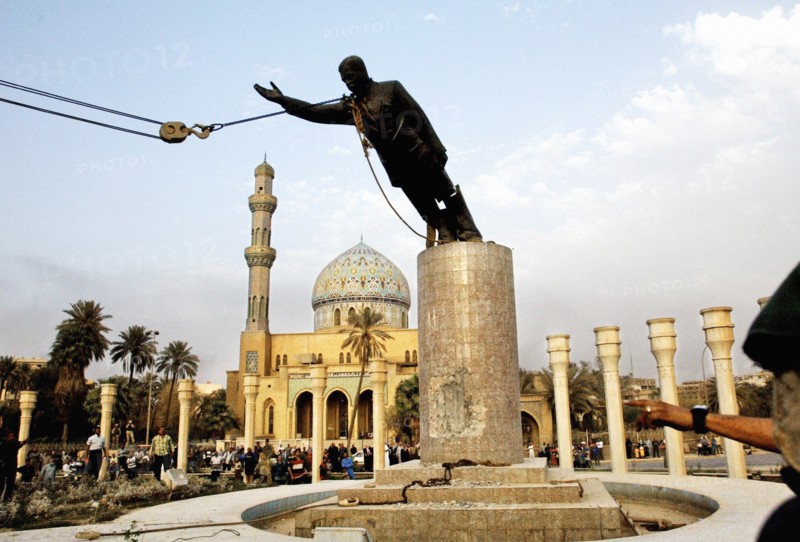 BAGHDAD  IRAQ WAR 2003 Statues Saddam Hussein