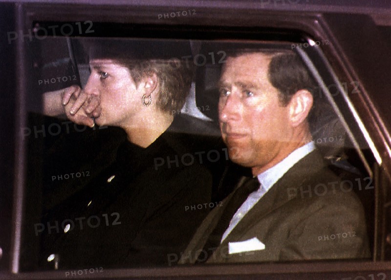 Princess Diana leaving the ski resort of Lech, Austria for home with husband Prince Charles after hearing news of the death of her father Earl Spencer.
30th March 1992.