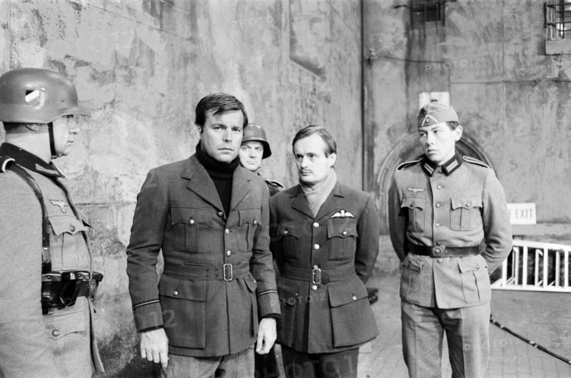 Colditz, Photo-call for new BBC television series, actors pose for the cameras on first day of filming, Ealing Studios, London, 19th June 1972.  Pictured, Robert Wagner as Flight Lieutenant Phil Carrington and David McCallum as Flight Lieutenant Simon Carter.