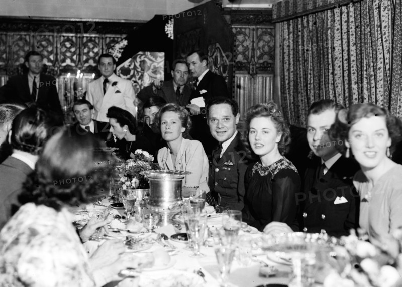 Douglas Bader and his wife at party, following the liberation of Colditz, where he was a POW.  29th May 1945.