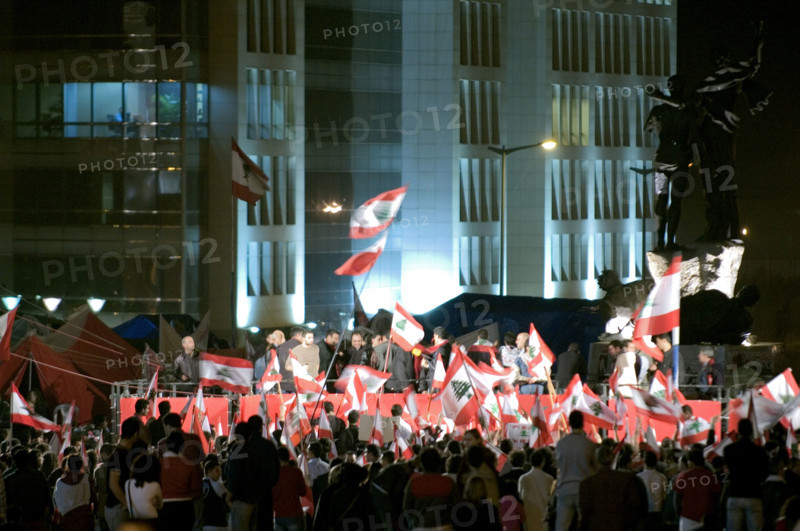 Lebanese protestors celebrate victory at Martyr's Square in Beirut