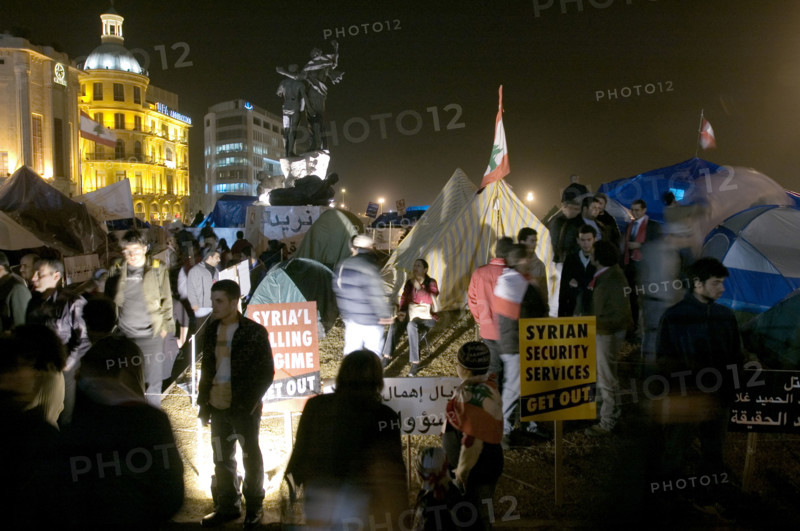 Lebanese protestors celebrate victory at Martyr's Square in Beirut