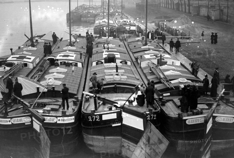 Inauguration of a train of ambulance-boats.  The ambulance barges.
