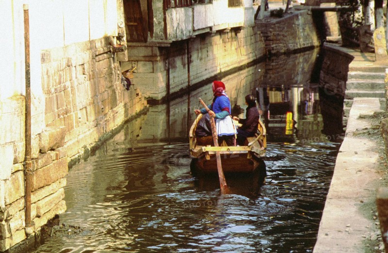 Woman boater, water route in the village, Zhouzhuang, an ancient town