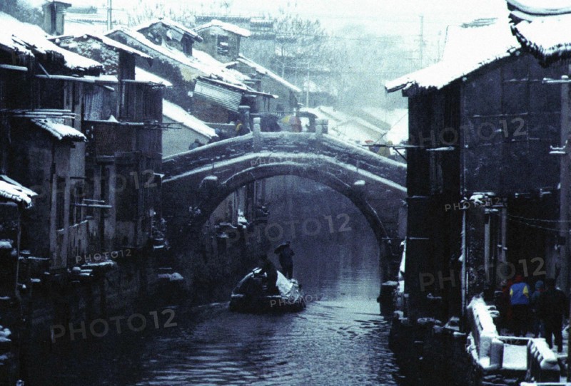 Bridge under the snow at Zhouzhuang, an ancient town