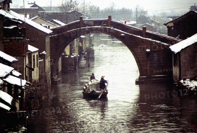Bridge under the snow at Zhouzhuang, an ancient town