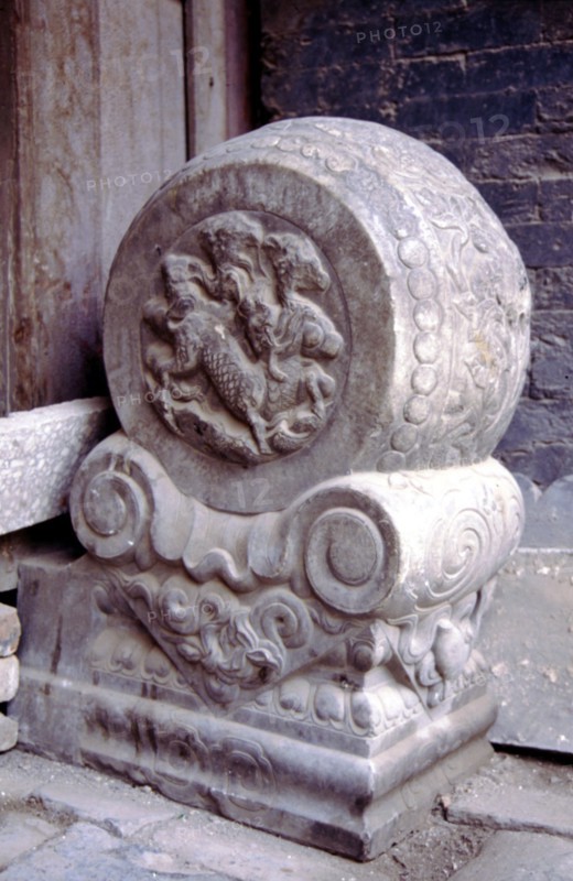 Hutong (Lanes) of Beijing, Shidun (two flat-shaped blocks of stone stand outside the door)