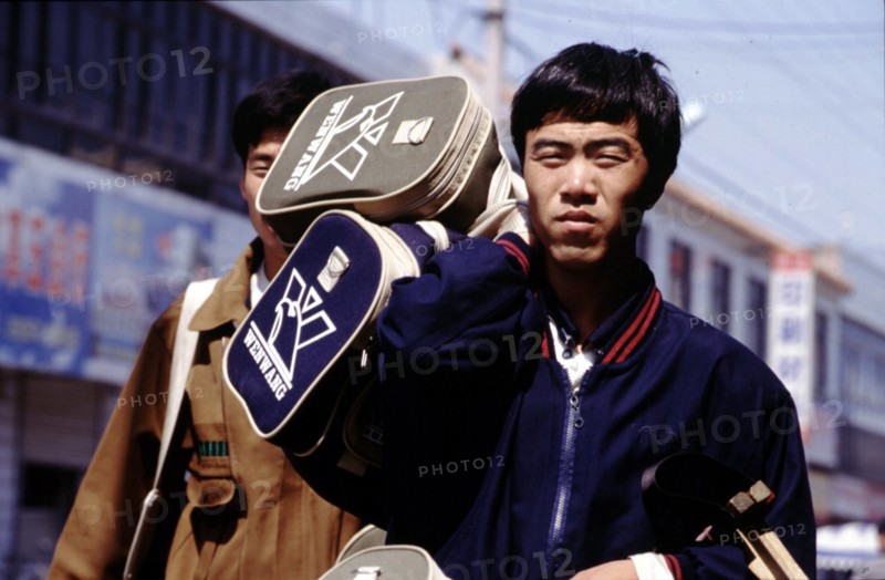 A man carrying a bag