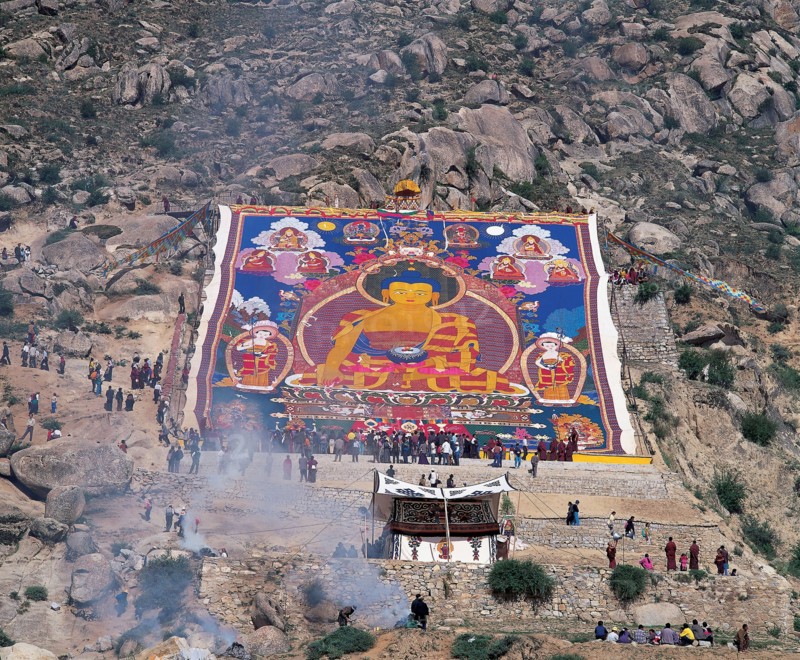 Spread out the scroll of Buddha on the sunshine, Drepung Monastery, China