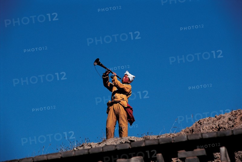Homme jouant de la trompette, Chine