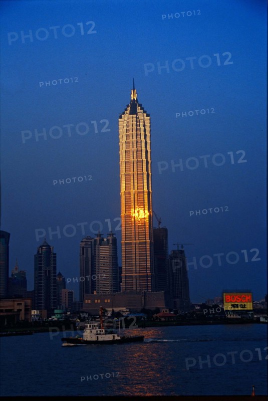 The sun reflected on the windows of Jinmao building at sunset, shanghai,China