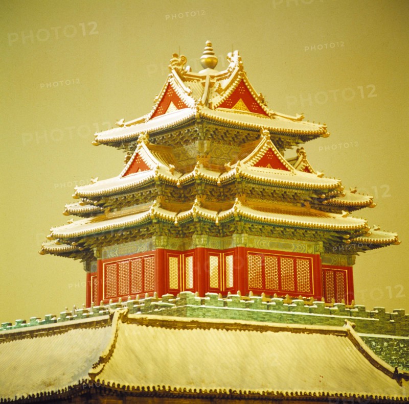 a corner tower of the Forbidden City in snow,Beijing,China