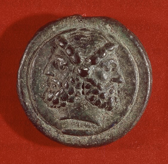 *MONEDA DE BRONCE - JANO REY DE LACIO (BIFRONTE) - S IV A JC
ROMA, MUSEO DE LAS TERMAS
ITALIA