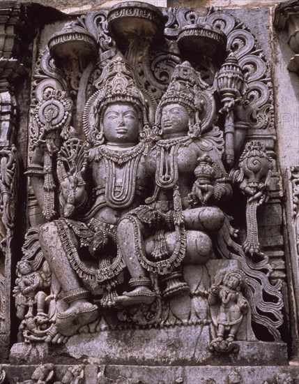 EXTERIOR-ESCULTURA DE SHIVA Y PARVATI-S XII
HALEBIT, TEMPLO HOYSALESVARA
INDIA

This image is not downloadable. Contact us for the high res.